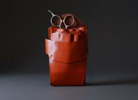 Orange leather holster with five scissor pockets