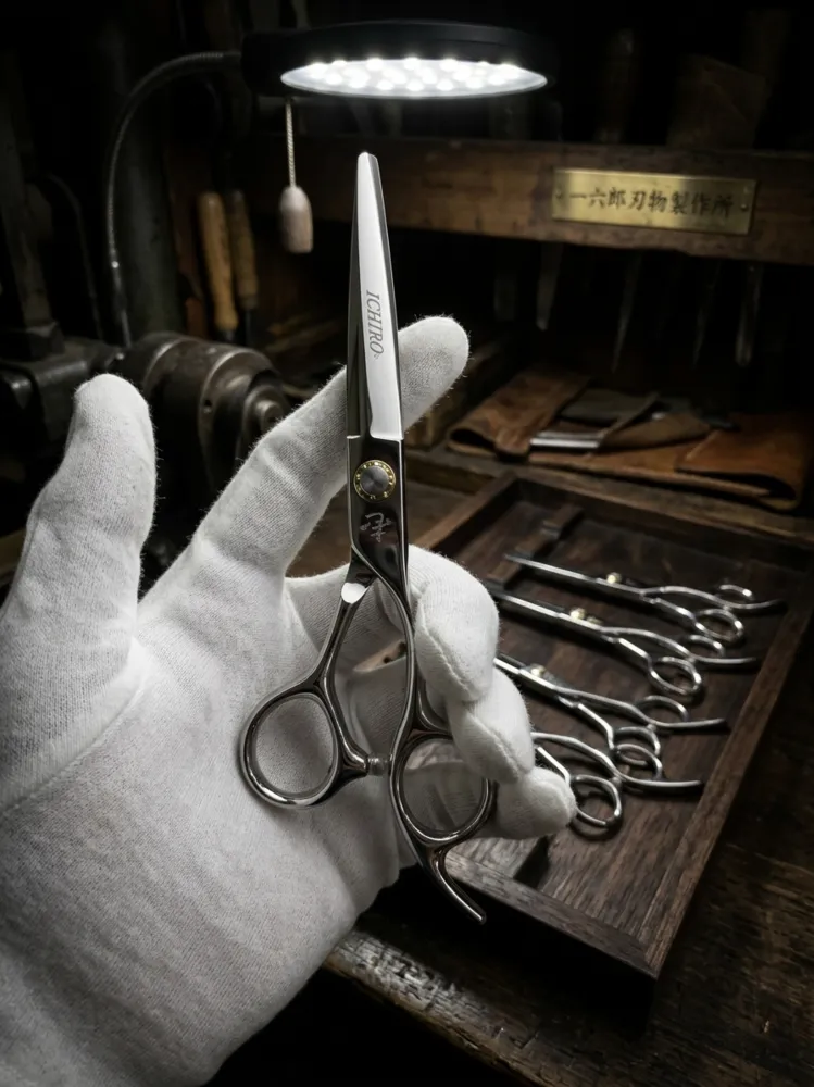 Japanese scissors craftsman with white gloves inspecting shears